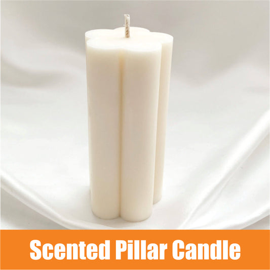 A set of large pillar candles, elegantly crafted and ready to illuminate any space with their warm, inviting glow. White Pillar Candles